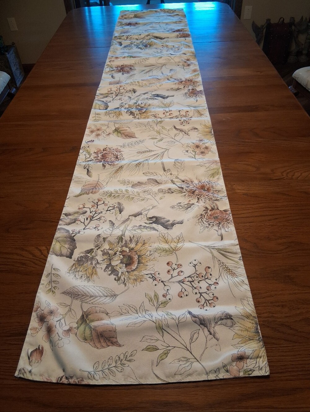 White silky fabric runner featuring a botanical floral and autumn leaf print